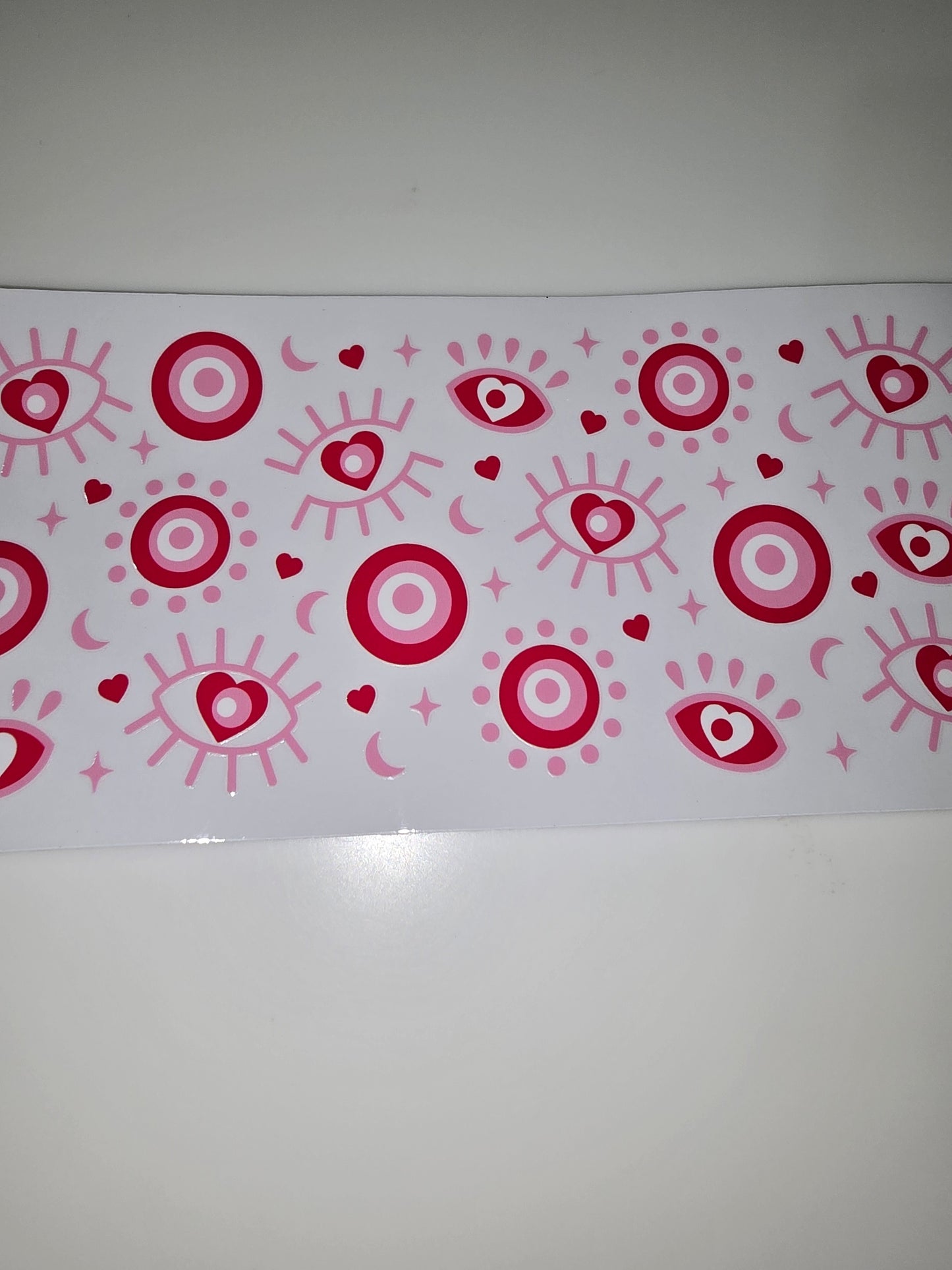 Red evil eye and hearts