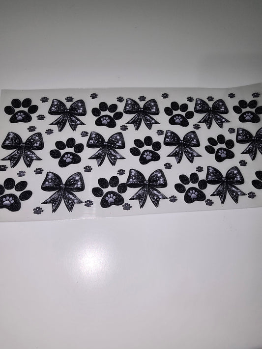 Black bows and paw prints
